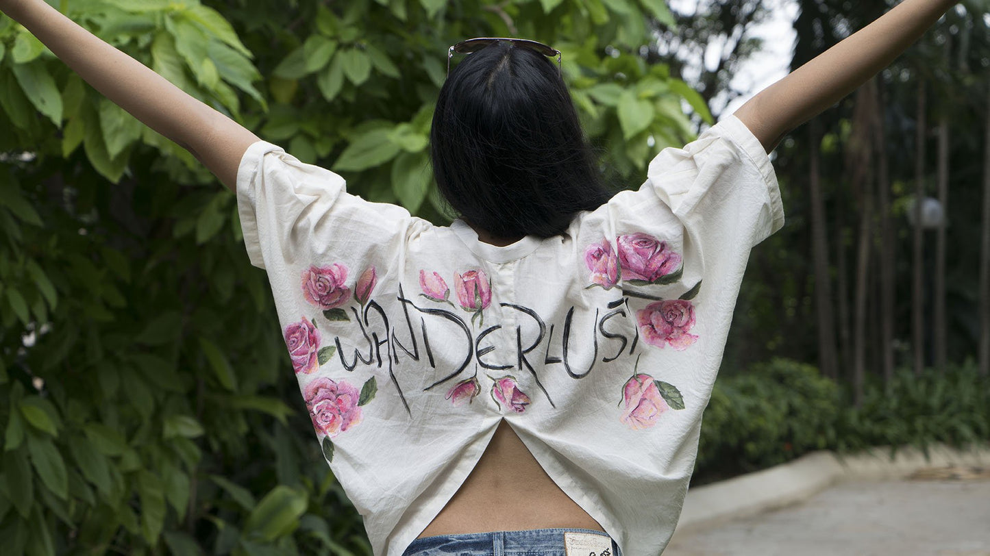 Boxy shirt with wanderlust print